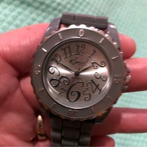 Kim Rogers watch. Rubber strap material for arm strap. Worn only once.